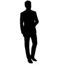 An attractive man in a men`s business men slim suit, jacket for wedding and business. silhouette Royalty Free Stock Photo