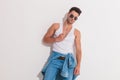 Attractive man pulling down his undershirt Royalty Free Stock Photo