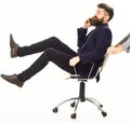 Attractive man talking on cell sitting on chair Royalty Free Stock Photo