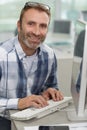 Attractive man using laptop Royalty Free Stock Photo