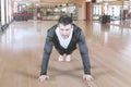 Attractive man warming up and doing some push-up Royalty Free Stock Photo