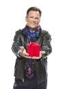 Attractive Man Wearing Black Leather Jacket Holding Christmas Gift on White Royalty Free Stock Photo