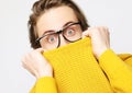 Attractive man wearing yellow sweater astonished and amazed in shock and surprise face expression Royalty Free Stock Photo