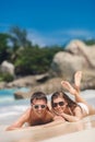 An attractive man and woman on the beach. Royalty Free Stock Photo