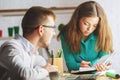 Attractive man and woman working on project Royalty Free Stock Photo