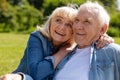 Attractive mature woman embracing her husband Royalty Free Stock Photo