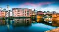 Attractive medieval arched St Trinity bridge Ponte Santa Trinita over Arno river. Colorful spring sunset in Florence, Italy, Eur Royalty Free Stock Photo