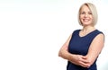 Attractive middle aged woman with folded arms on white background Royalty Free Stock Photo