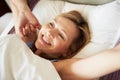 Attractive Middle Aged Woman Waking Up In Bed Royalty Free Stock Photo