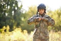 Attractive military female is wearing soldier outfit, suit