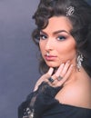 Close-up of Young Caucasian Woman with Jewelry. She Wears a White Crystal Long Earring, an Oval Crystal Under Her Nose and Two Royalty Free Stock Photo