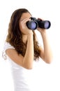 Attractive model watching through binocular Royalty Free Stock Photo