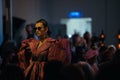 Attractive model wearing a puffy dress during the African fashion up show in hotel Salomon Paris