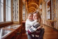 Mother and daughter exploring expositions in museum