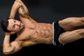 Attractive muscle man laying on the floor Royalty Free Stock Photo