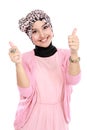 Attractive muslim woman giving thumbs up