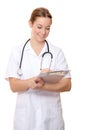 Attractive nurse holding clinical record