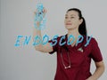 Attractive Nurse with marker writing ENDOSCOPY Upper Gastrointestinal