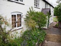 An attractive period cottage besides the Grand Union Canal Royalty Free Stock Photo