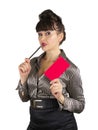 Posed attractive older business woman holding little red book. Royalty Free Stock Photo