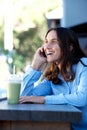 Attractive older woman talking on mobile phone outside Royalty Free Stock Photo