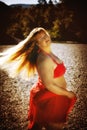 Attractive overweight woman in stylish red outfit Royalty Free Stock Photo