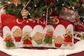 Adorable pillows and ornaments on and under Christmas trees entered in auction for Catholic Charities, Saratoga New York, 2019