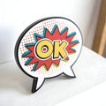 Attractive Pop Art Retro Comic Speech Bubble with OK Text Expression Isolated on White Background Royalty Free Stock Photo