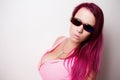 Portrait girl in pink clothes with sunglasses Royalty Free Stock Photo