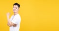 Attractive portrait happy young asian man pointing showing looking side for banner Royalty Free Stock Photo