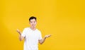 Attractive portrait happy young asian man under head showing looking side for banner Royalty Free Stock Photo