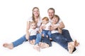 Attractive portrait of young happy family over white background Royalty Free Stock Photo