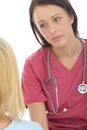 Attractive Professional Young Female Doctor Having A Conversation With A Patient Royalty Free Stock Photo