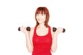 Attractive readhead female lifting weights