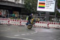 Attractive Red bull branded motorbike rider on his motorbike performing