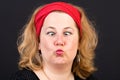 Attractive red haired lite overweight european mature woman with Royalty Free Stock Photo