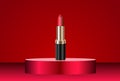 Attractive red lipstick product on round premium podium. Isolated on red background. Makeup container mockup