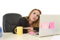 Attractive 40s blond businesswoman working at office laptop computer Royalty Free Stock Photo