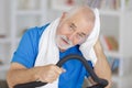 attractive senior man at health club exercising on stepper Royalty Free Stock Photo