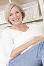 Attractive Senior Woman Relaxing At Home Royalty Free Stock Photo