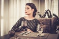 Attractive sensual young lady with glass of wine in restaurant Royalty Free Stock Photo