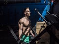 Handsome shirtless muscular man posing in gym Royalty Free Stock Photo