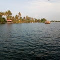 Attractive silent water river with houseboat trees in kerala