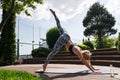 Attractive slim young lady leading healthy lifestyle and practicing yoga Royalty Free Stock Photo