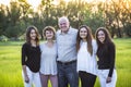 Attractive Smiling diverse family portrait outdoors