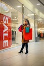 Attractive girl with shopping bag. Lifestyle Concept