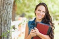 Attractive Smiling Mixed Race Young Girl Student with School Books Royalty Free Stock Photo