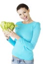 Attractive smiling woman with fresh salat