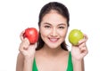 Attractive smiling young asian woman holding green apple isolate Royalty Free Stock Photo