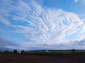 An attractive snapshot of a pleasing view of a spunky pattern of white clouds in blue sky